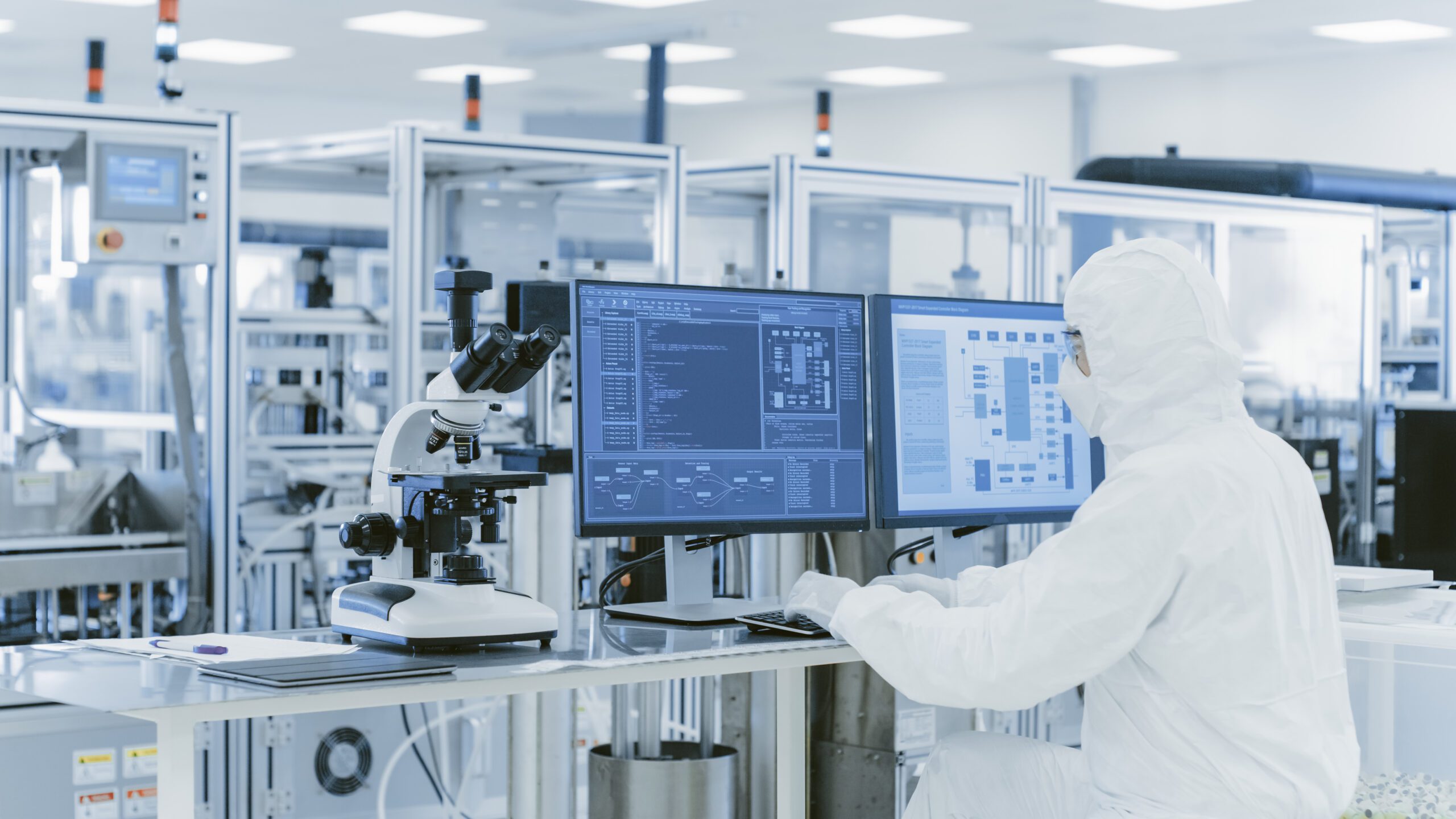 In,Laboratory,Over,The,Shoulder,View,Of,Scientist,In,Protective